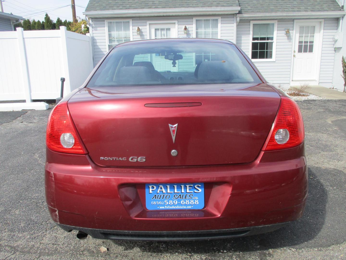 2009 RED Pontiac G6 Sedan (1G2ZJ57B994) with an 2.4L L4 DOHC 16V engine, 4-Speed Automatic transmission, located at 540a Delsea Drive, Sewell, NJ, 08080, (987) 867-5309, 39.752560, -75.111206 - Photo#2