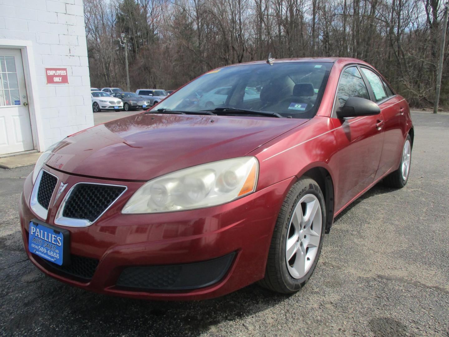 2009 RED Pontiac G6 Sedan (1G2ZJ57B994) with an 2.4L L4 DOHC 16V engine, 4-Speed Automatic transmission, located at 540a Delsea Drive, Sewell, NJ, 08080, (987) 867-5309, 39.752560, -75.111206 - Photo#0