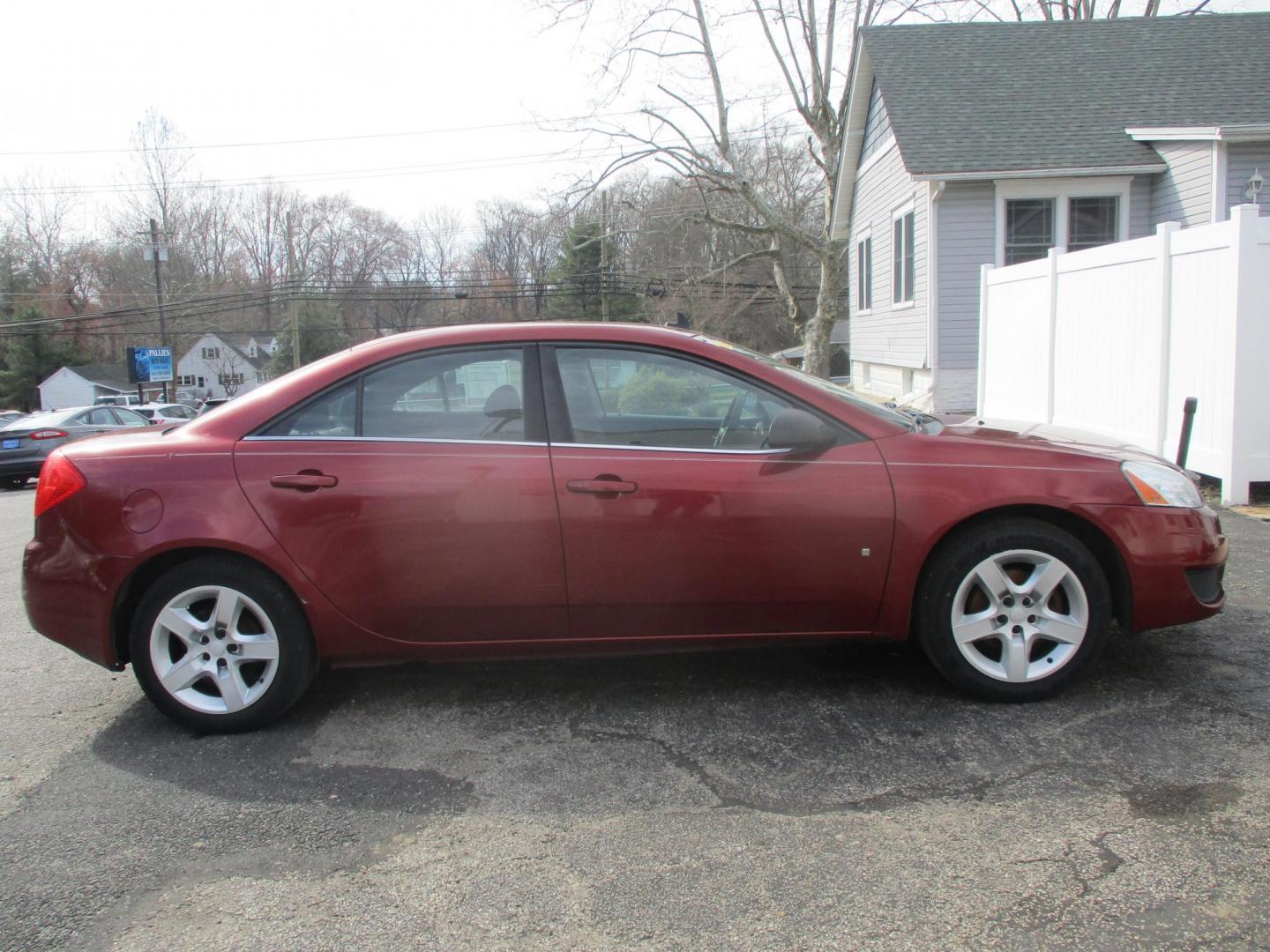 2009 RED Pontiac G6 Sedan (1G2ZJ57B994) with an 2.4L L4 DOHC 16V engine, 4-Speed Automatic transmission, located at 540a Delsea Drive, Sewell, NJ, 08080, (987) 867-5309, 39.752560, -75.111206 - Photo#4