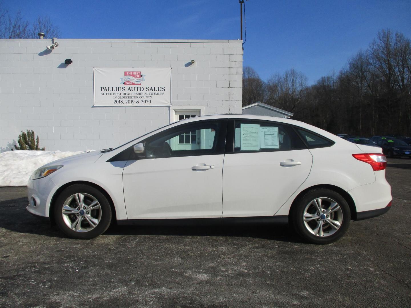 2014 WHITE Ford Focus SE Sedan (1FADP3F28EL) with an 2.0L L4 DOHC 16V engine, located at 540a Delsea Drive, Sewell, NJ, 08080, (987) 867-5309, 39.752560, -75.111206 - Photo#1