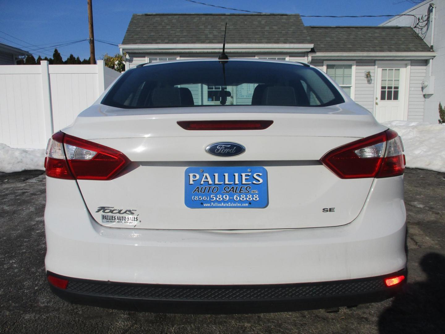 2014 WHITE Ford Focus SE Sedan (1FADP3F28EL) with an 2.0L L4 DOHC 16V engine, located at 540a Delsea Drive, Sewell, NJ, 08080, (987) 867-5309, 39.752560, -75.111206 - Photo#3