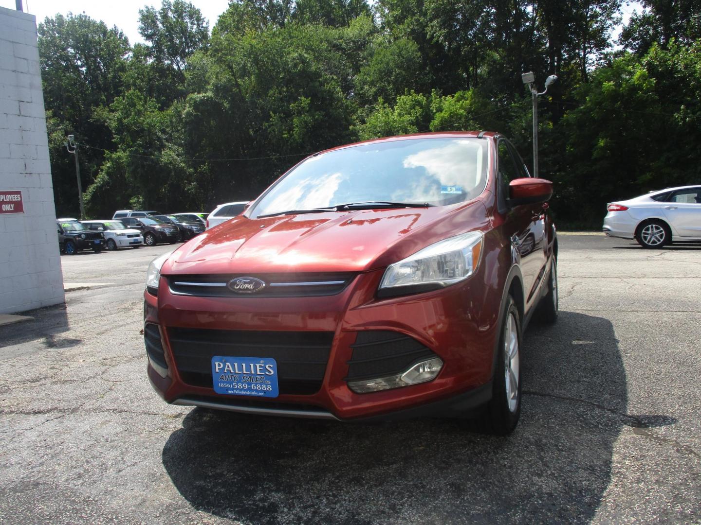 2014 RED Ford Escape SE 4WD (1FMCU9G92EU) with an 2.0L L4 DOHC 16V engine, 6-Speed Automatic transmission, located at 540a Delsea Drive, Sewell, NJ, 08080, (987) 867-5309, 39.752560, -75.111206 - Photo#0