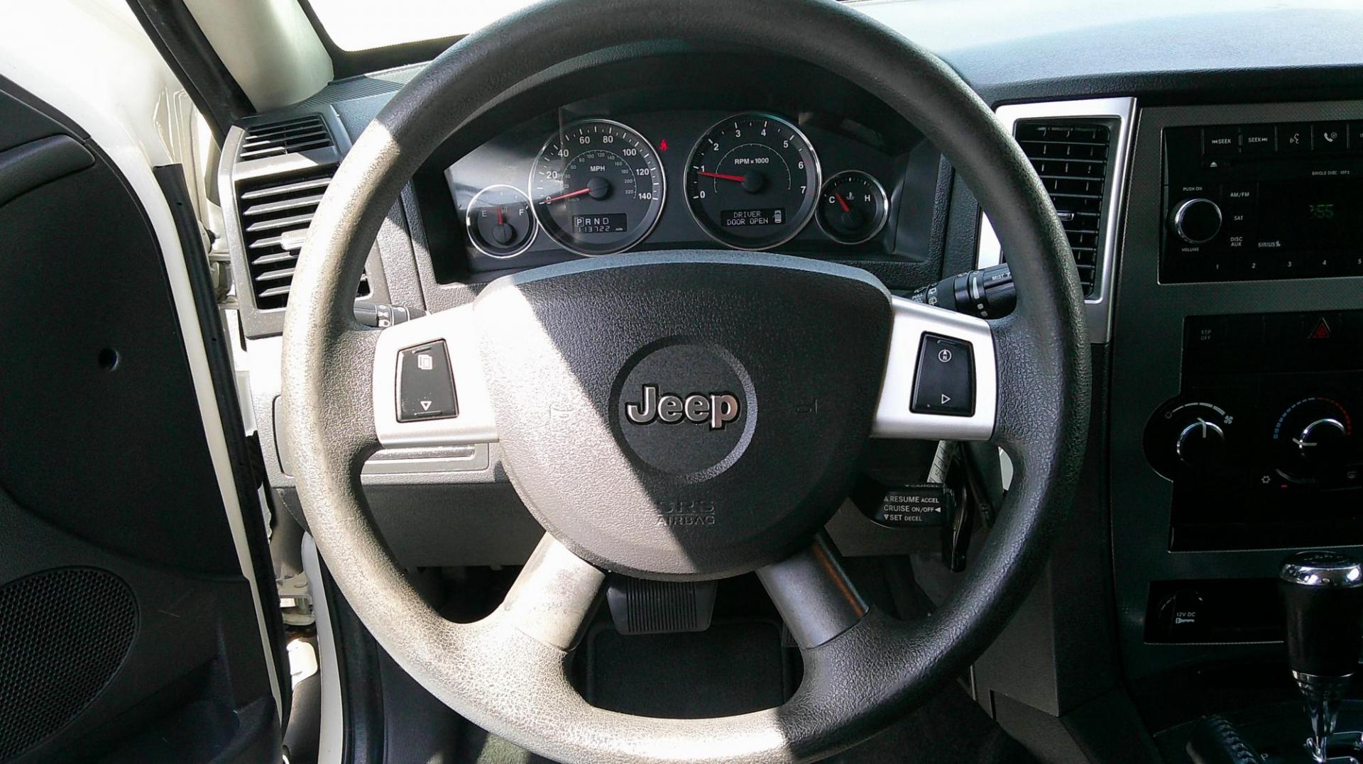2009 WHITE Jeep Grand Cherokee Laredo 4WD (1J8GR48K89C) with an 3.7L V6 SOHC 12V engine, 5-Speed Automatic transmission, located at 540a Delsea Drive, Sewell, NJ, 08080, (987) 867-5309, 39.752560, -75.111206 - Photo#15