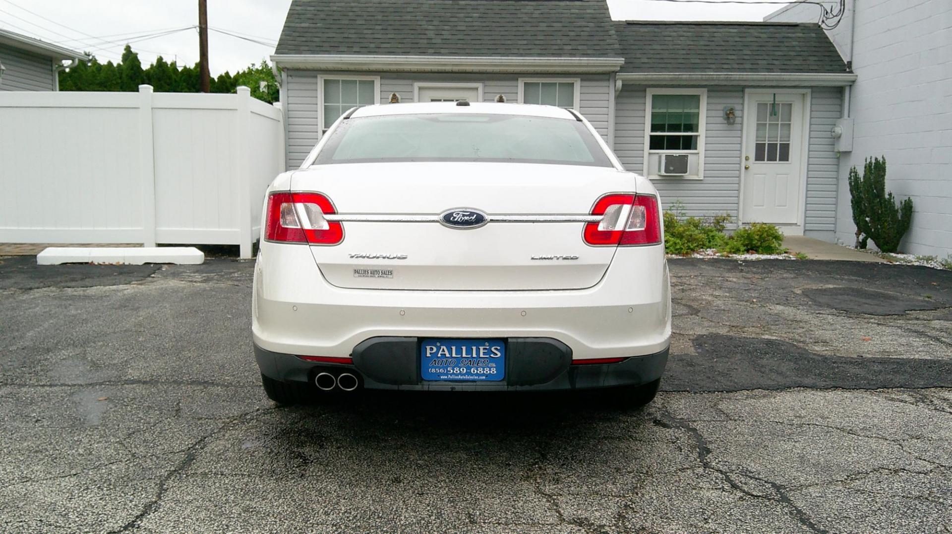 2010 WHITE Ford Taurus Limited FWD (1FAHP2FW7AG) with an 3.5L V6 DOHC 24V engine, 6-Speed Automatic transmission, located at 540a Delsea Drive, Sewell, NJ, 08080, (987) 867-5309, 39.752560, -75.111206 - Photo#4