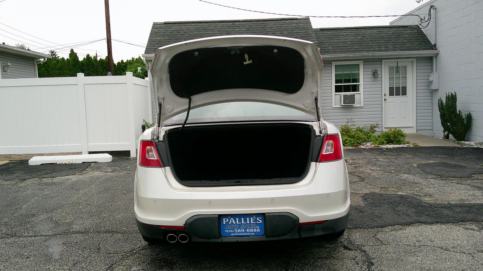 2010 WHITE Ford Taurus Limited FWD (1FAHP2FW7AG) with an 3.5L V6 DOHC 24V engine, 6-Speed Automatic transmission, located at 540a Delsea Drive, Sewell, NJ, 08080, (987) 867-5309, 39.752560, -75.111206 - Photo#26