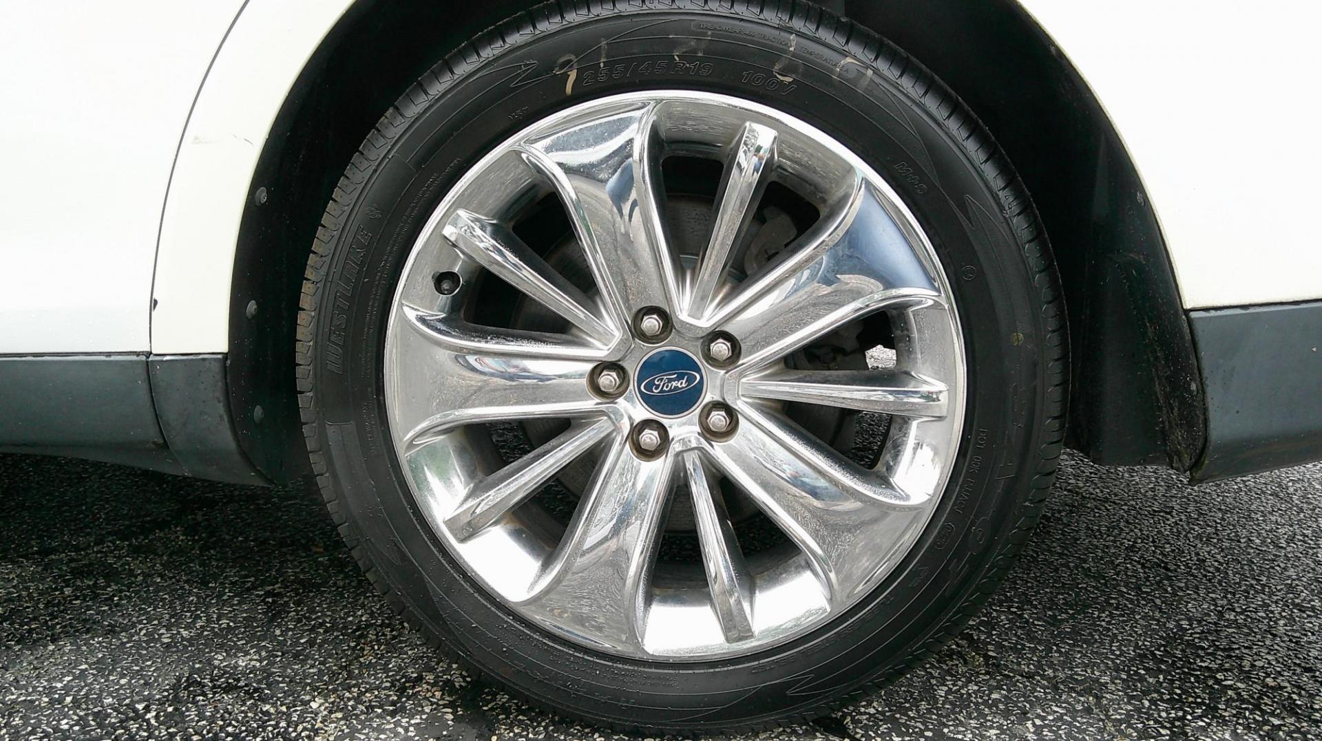 2010 WHITE Ford Taurus Limited FWD (1FAHP2FW7AG) with an 3.5L V6 DOHC 24V engine, 6-Speed Automatic transmission, located at 540a Delsea Drive, Sewell, NJ, 08080, (987) 867-5309, 39.752560, -75.111206 - Photo#28