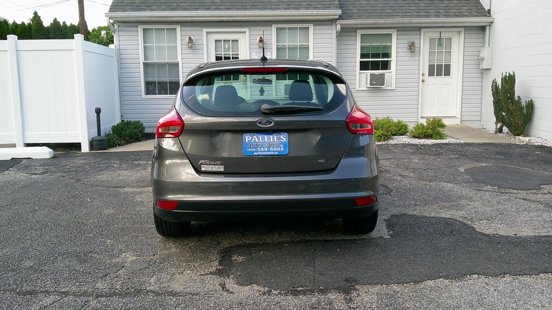 2016 GRAY Ford Focus SE Hatch (1FADP3K29GL) with an 2.0L L4 DOHC 16V engine, located at 540a Delsea Drive, Sewell, NJ, 08080, (987) 867-5309, 39.752560, -75.111206 - Photo#4