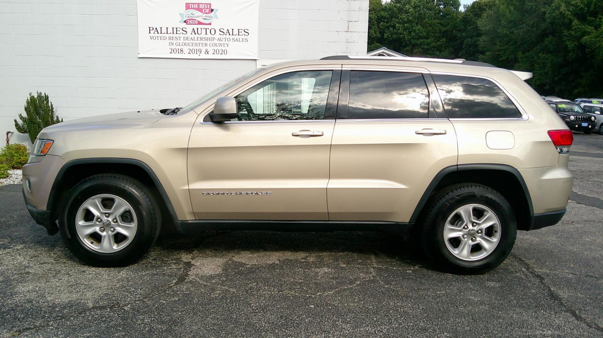 2014 GOLD Jeep Grand Cherokee Laredo 4WD (1C4RJFAG9EC) with an 3.6L V6 DOHC 24V engine, 5-Speed Automatic transmission, located at 540a Delsea Drive, Sewell, NJ, 08080, (987) 867-5309, 39.752560, -75.111206 - Photo#1