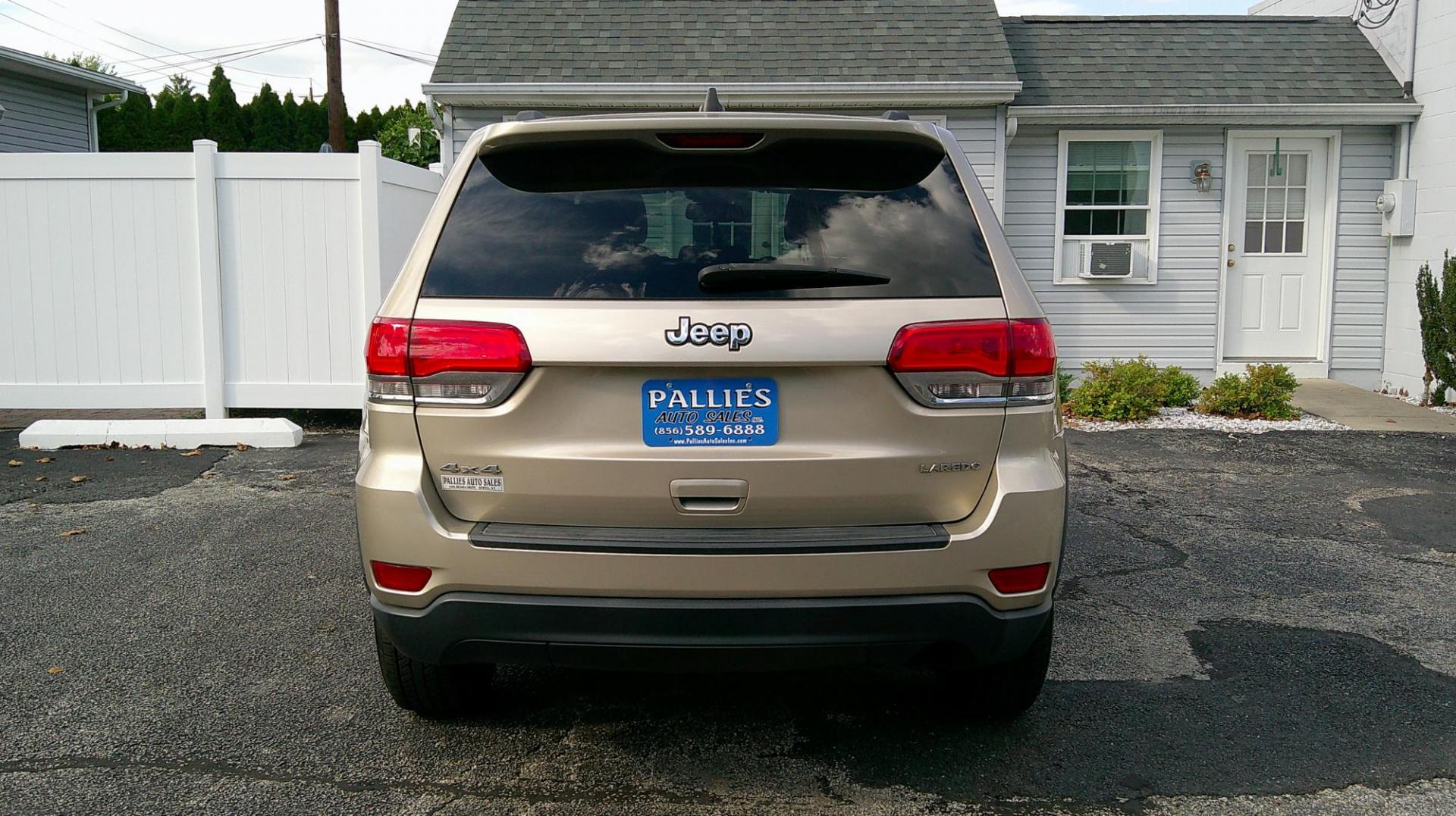 2014 GOLD Jeep Grand Cherokee Laredo 4WD (1C4RJFAG9EC) with an 3.6L V6 DOHC 24V engine, 5-Speed Automatic transmission, located at 540a Delsea Drive, Sewell, NJ, 08080, (987) 867-5309, 39.752560, -75.111206 - Photo#3