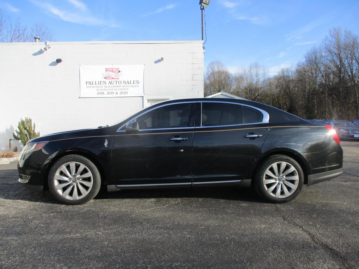 2015 BLACK Lincoln MKS AWD (1LNHL9EK0FG) with an 3.7L V6 DOHC 24V engine, 6-Speed Automatic transmission, located at 540a Delsea Drive, Sewell, NJ, 08080, (987) 867-5309, 39.752560, -75.111206 - Photo#1
