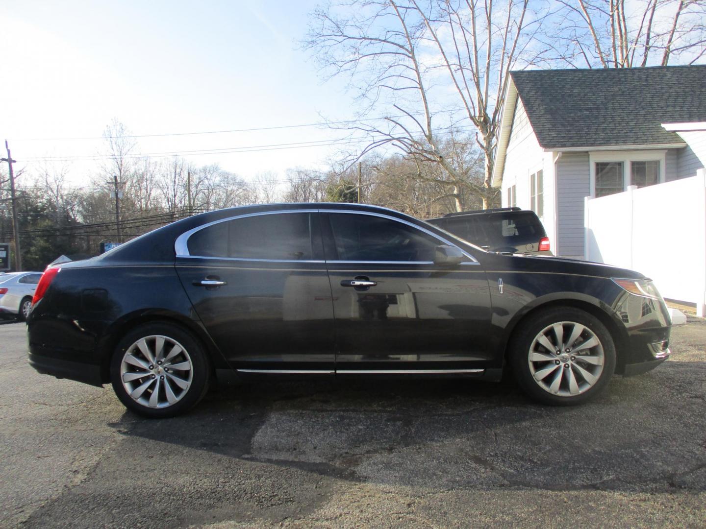2015 BLACK Lincoln MKS AWD (1LNHL9EK0FG) with an 3.7L V6 DOHC 24V engine, 6-Speed Automatic transmission, located at 540a Delsea Drive, Sewell, NJ, 08080, (987) 867-5309, 39.752560, -75.111206 - Photo#7
