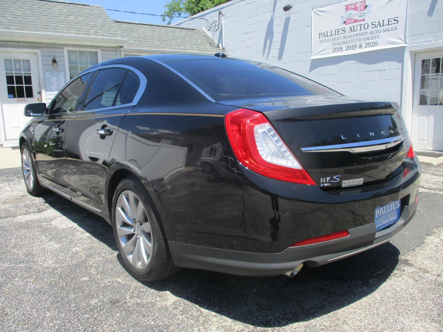 2015 BLACK Lincoln MKS AWD (1LNHL9EK0FG) with an 3.7L V6 DOHC 24V engine, 6-Speed Automatic transmission, located at 540a Delsea Drive, Sewell, NJ, 08080, (987) 867-5309, 39.752560, -75.111206- Photo#2