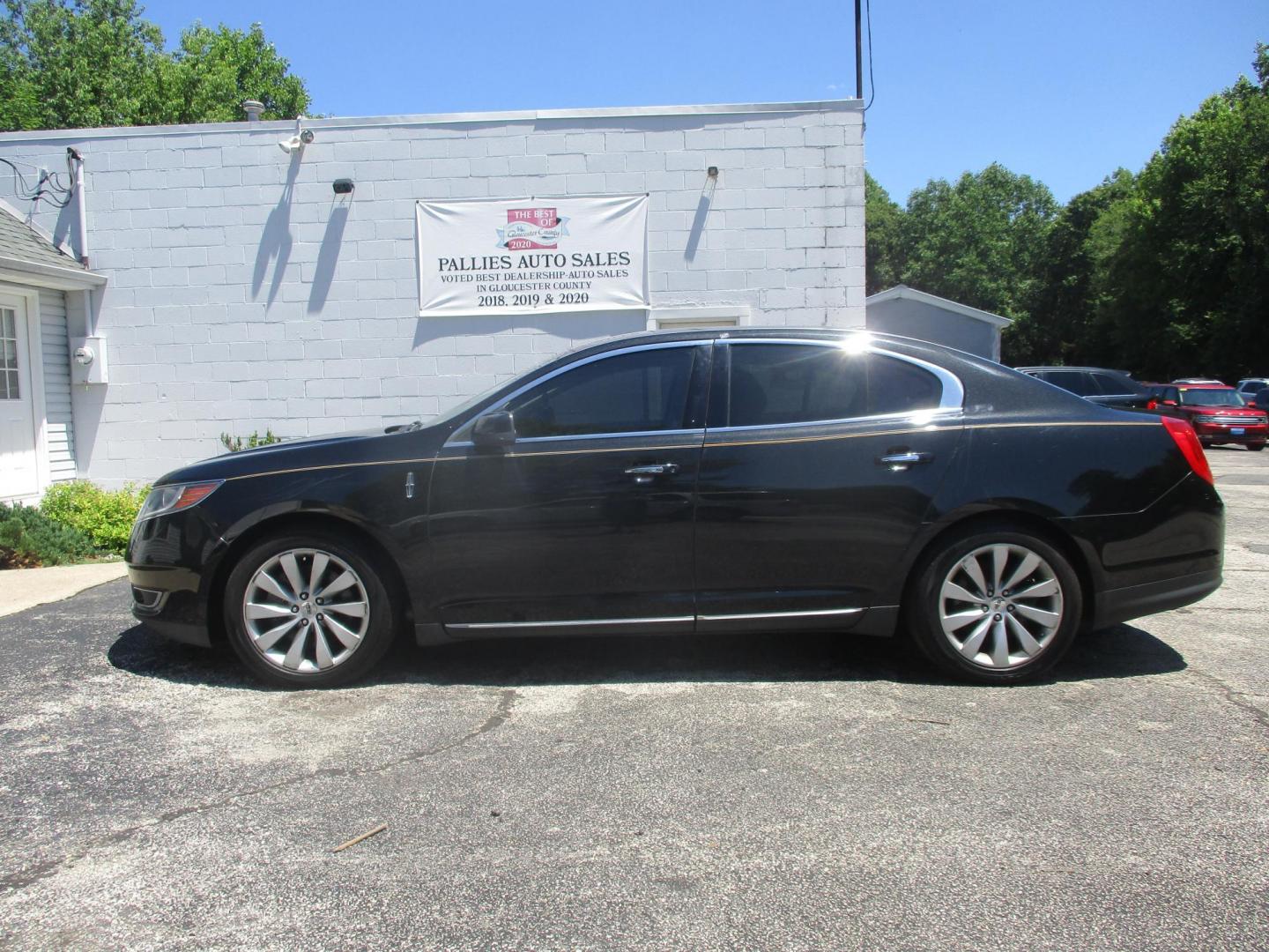 2015 BLACK Lincoln MKS AWD (1LNHL9EK0FG) with an 3.7L V6 DOHC 24V engine, 6-Speed Automatic transmission, located at 540a Delsea Drive, Sewell, NJ, 08080, (987) 867-5309, 39.752560, -75.111206- Photo#1