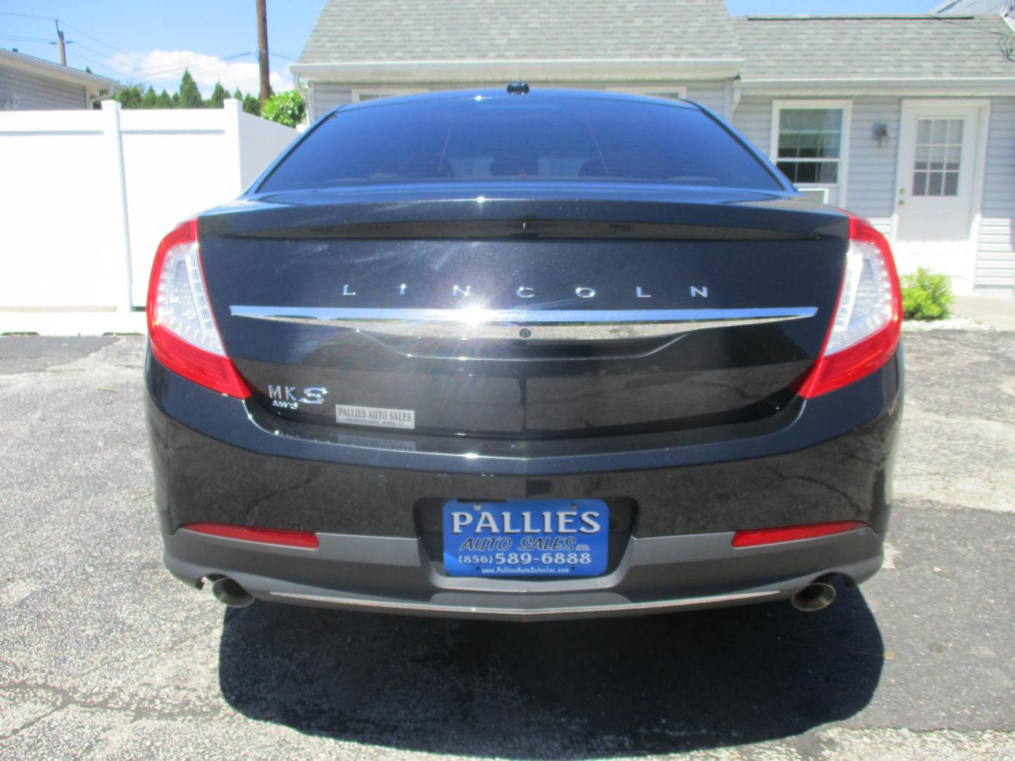 2015 BLACK Lincoln MKS AWD (1LNHL9EK0FG) with an 3.7L V6 DOHC 24V engine, 6-Speed Automatic transmission, located at 540a Delsea Drive, Sewell, NJ, 08080, (987) 867-5309, 39.752560, -75.111206- Photo#3