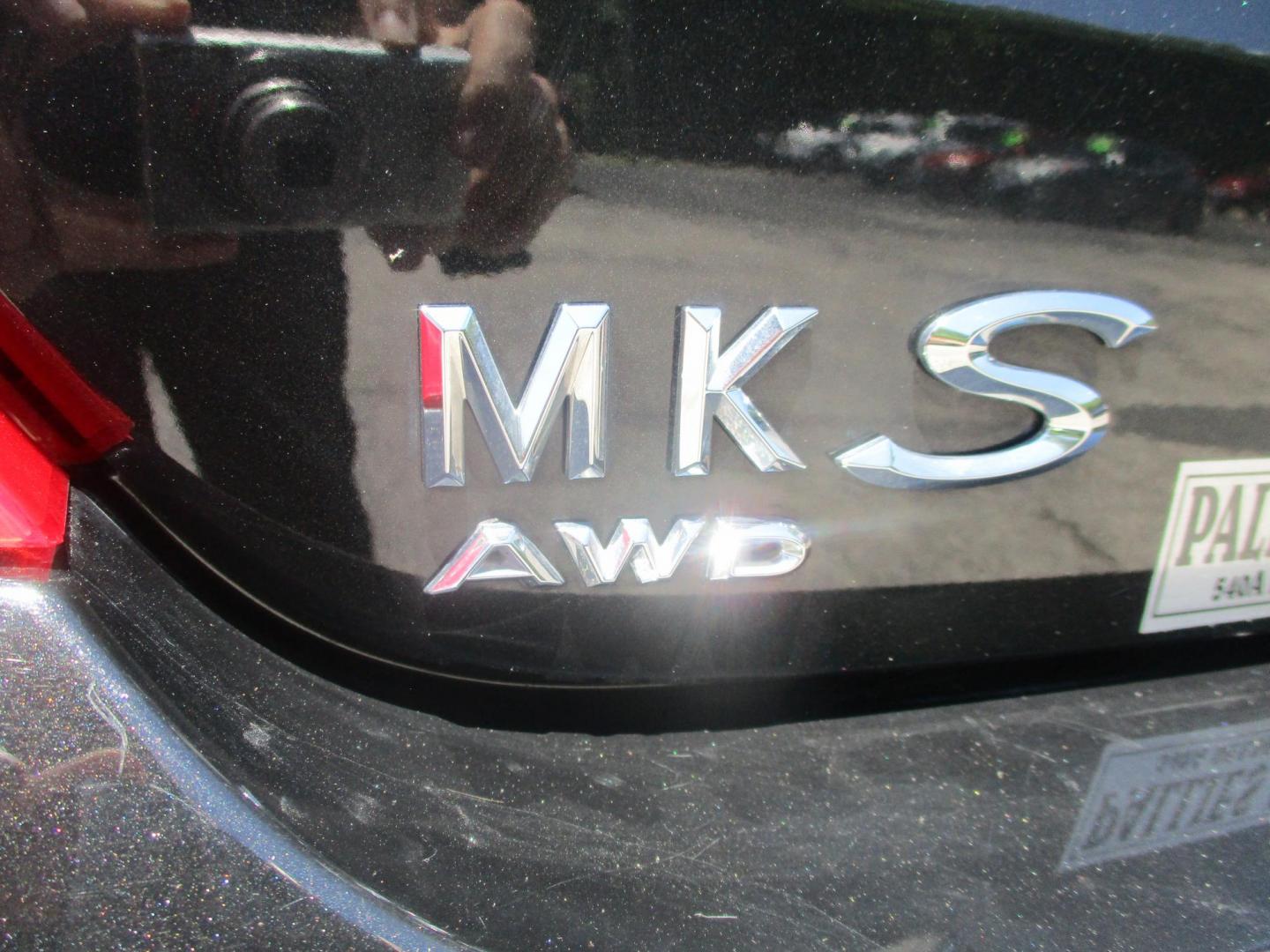 2015 BLACK Lincoln MKS AWD (1LNHL9EK0FG) with an 3.7L V6 DOHC 24V engine, 6-Speed Automatic transmission, located at 540a Delsea Drive, Sewell, NJ, 08080, (987) 867-5309, 39.752560, -75.111206- Photo#5