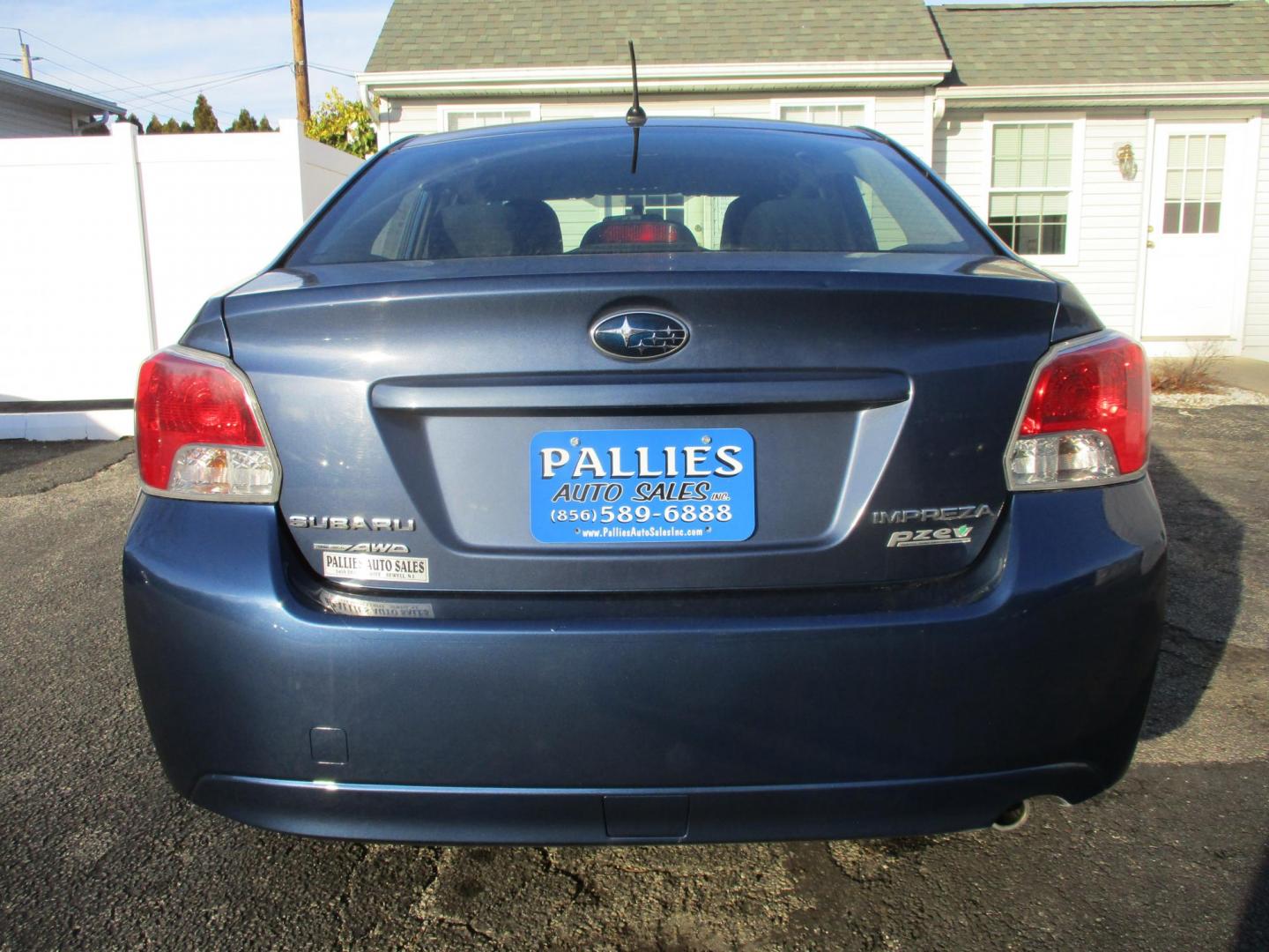 2013 BLUE Subaru Impreza Base 4-Door (JF1GJAA62DH) with an 2.0L H4 DOHC 16V engine, Continuously Variable Transmission transmission, located at 540a Delsea Drive, Sewell, NJ, 08080, (987) 867-5309, 39.752560, -75.111206 - Photo#2