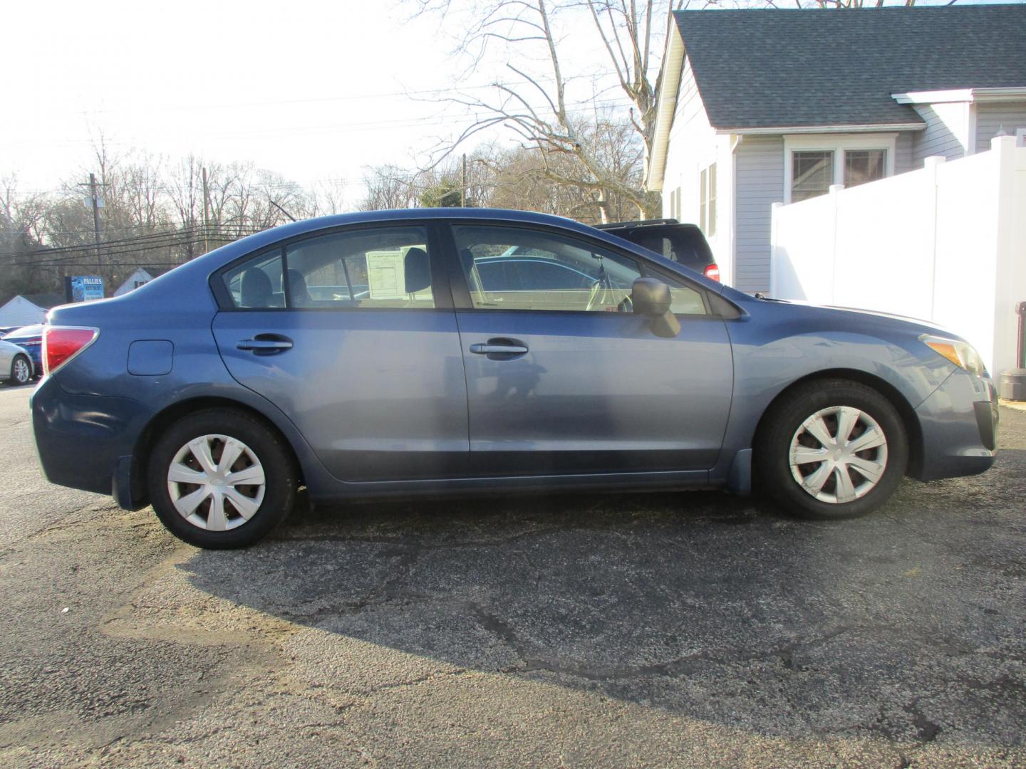 2013 BLUE Subaru Impreza Base 4-Door (JF1GJAA62DH) with an 2.0L H4 DOHC 16V engine, Continuously Variable Transmission transmission, located at 540a Delsea Drive, Sewell, NJ, 08080, (987) 867-5309, 39.752560, -75.111206 - Photo#7