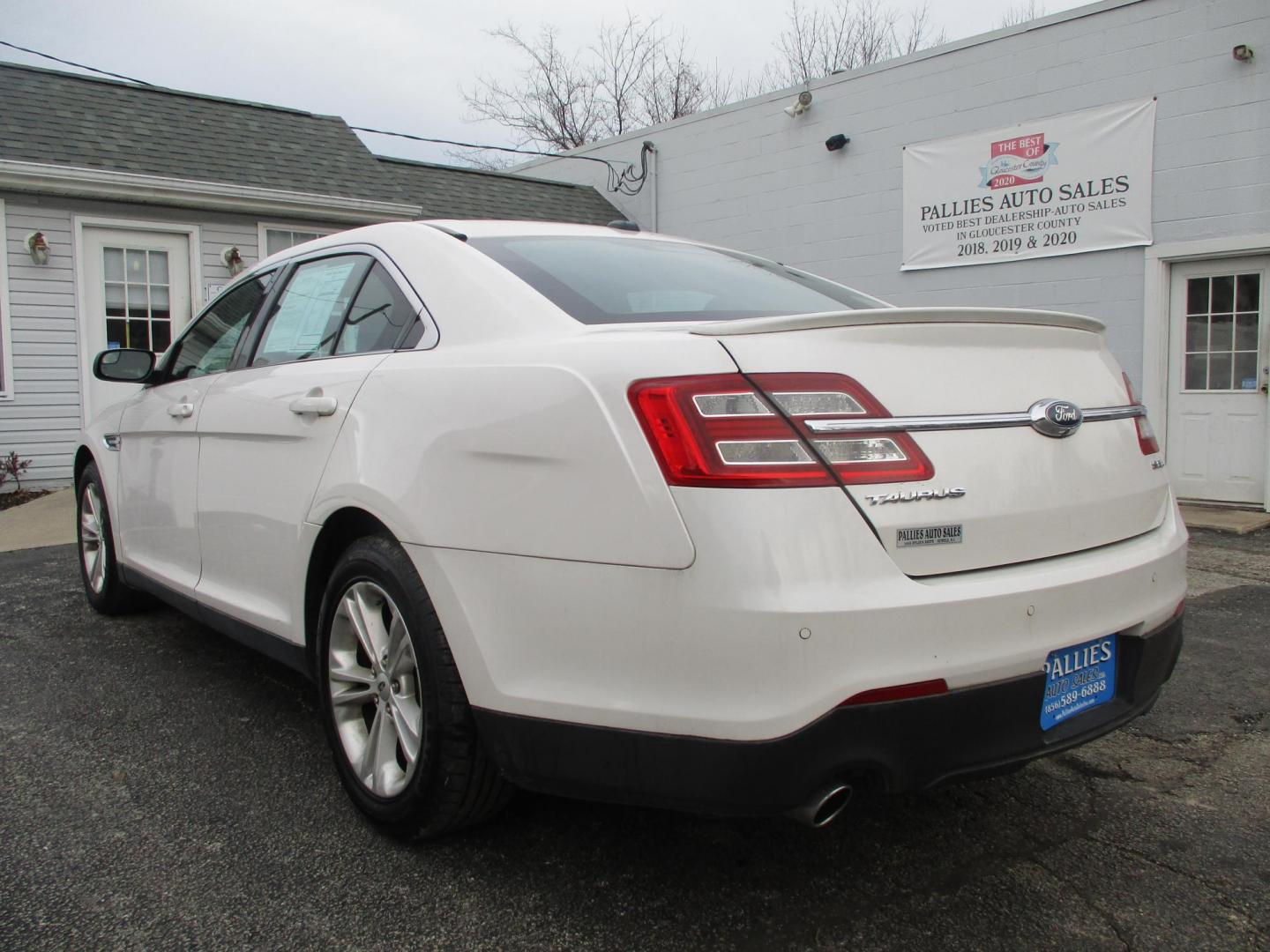 2015 WHITE Ford Taurus SEL FWD (1FAHP2E88FG) with an 3.5L V6 DOHC 24V engine, 6-Speed Automatic transmission, located at 540a Delsea Drive, Sewell, NJ, 08080, (987) 867-5309, 39.752560, -75.111206 - Photo#2