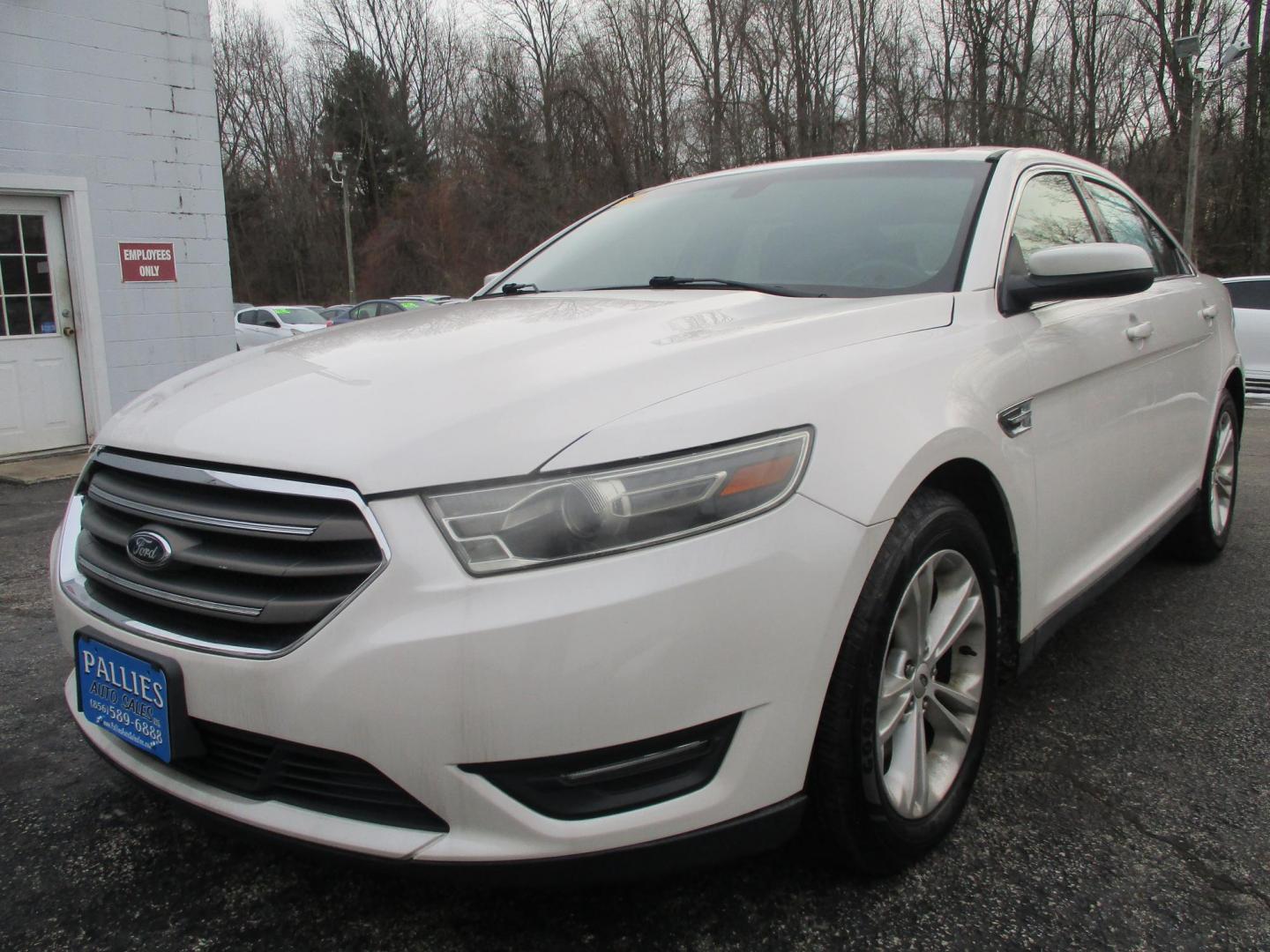 2015 WHITE Ford Taurus SEL FWD (1FAHP2E88FG) with an 3.5L V6 DOHC 24V engine, 6-Speed Automatic transmission, located at 540a Delsea Drive, Sewell, NJ, 08080, (987) 867-5309, 39.752560, -75.111206 - Photo#0