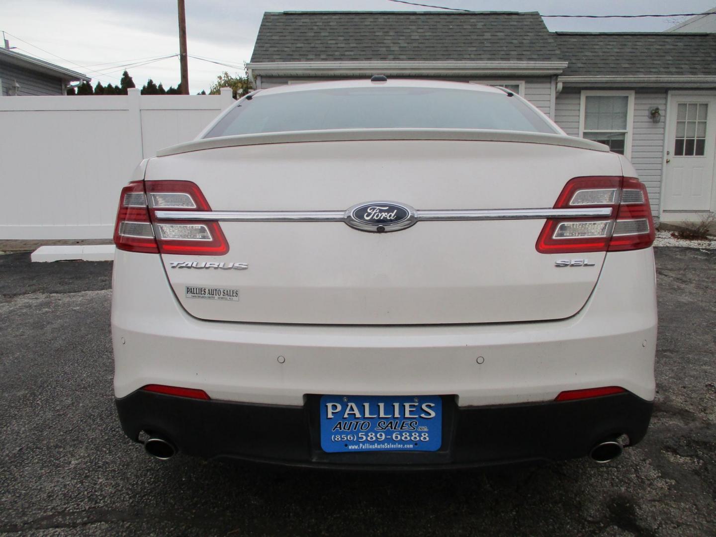 2015 WHITE Ford Taurus SEL FWD (1FAHP2E88FG) with an 3.5L V6 DOHC 24V engine, 6-Speed Automatic transmission, located at 540a Delsea Drive, Sewell, NJ, 08080, (987) 867-5309, 39.752560, -75.111206 - Photo#3