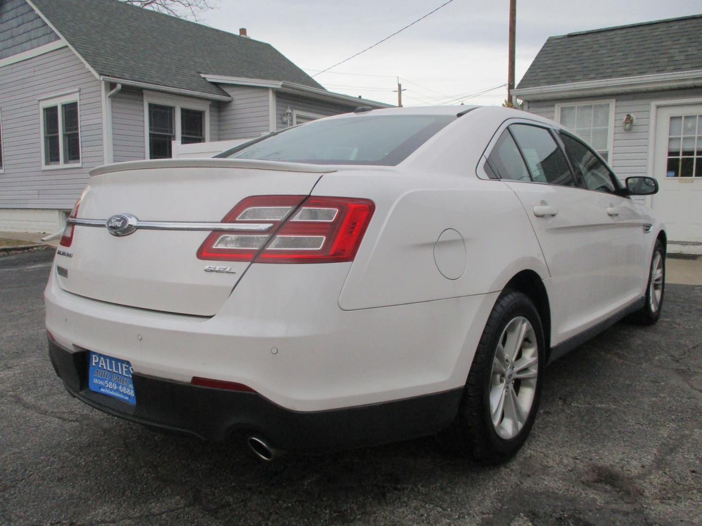 2015 WHITE Ford Taurus SEL FWD (1FAHP2E88FG) with an 3.5L V6 DOHC 24V engine, 6-Speed Automatic transmission, located at 540a Delsea Drive, Sewell, NJ, 08080, (987) 867-5309, 39.752560, -75.111206 - Photo#5
