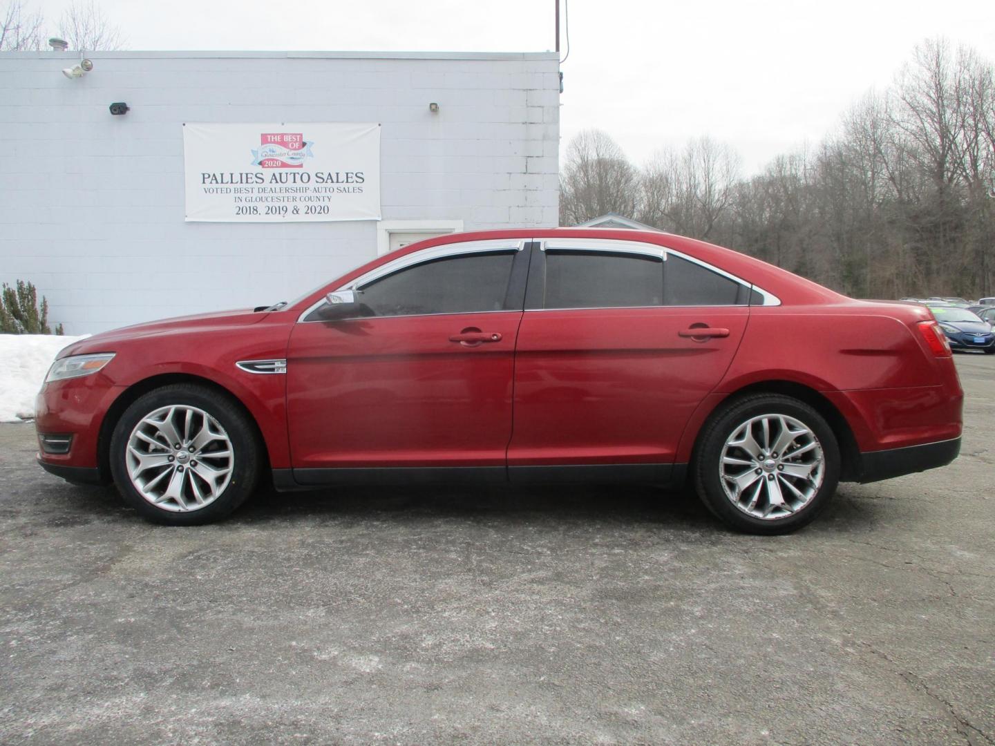 2013 RED Ford Taurus Limited FWD (1FAHP2F81DG) with an 3.5L V6 DOHC 24V engine, 6-Speed Automatic transmission, located at 540a Delsea Drive, Sewell, NJ, 08080, (987) 867-5309, 39.752560, -75.111206 - Photo#1