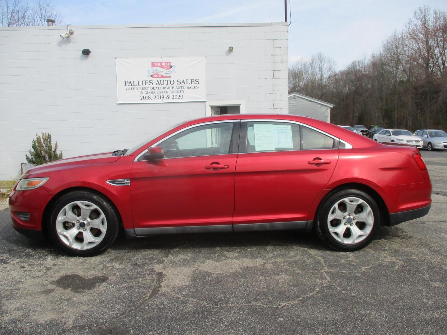 2011 RED Ford Taurus SEL FWD (1FAHP2EW4BG) with an 3.5L V6 DOHC 24V engine, 6-Speed Automatic transmission, located at 540a Delsea Drive, Sewell, NJ, 08080, (987) 867-5309, 39.752560, -75.111206 - Photo#1