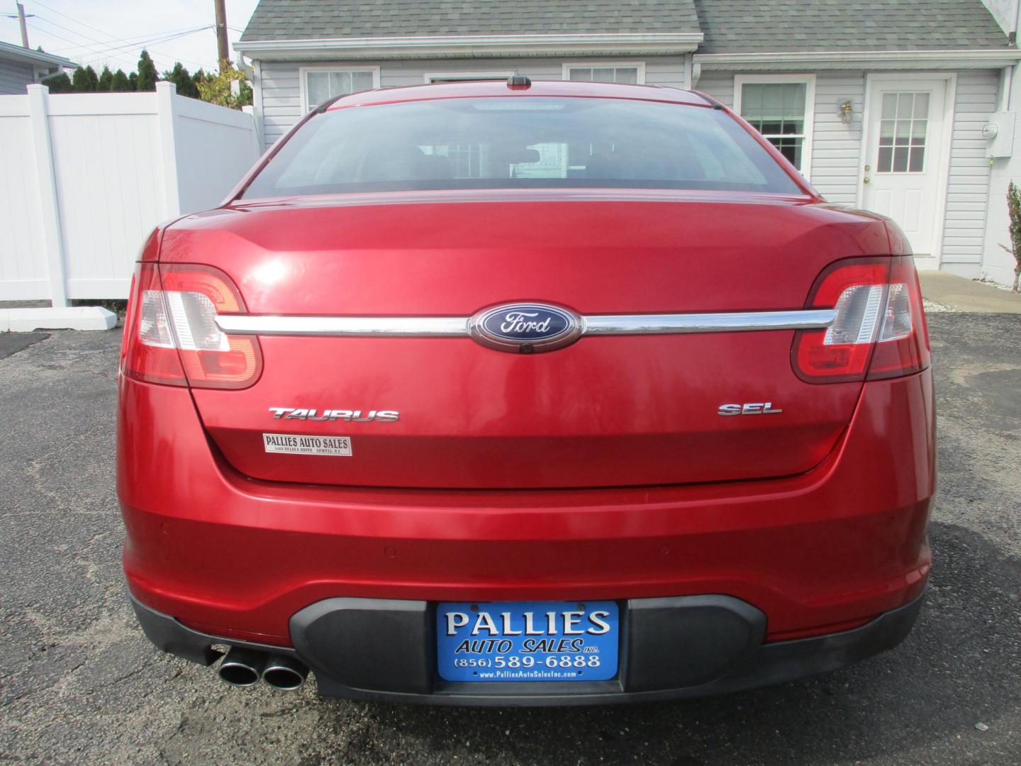 2011 RED Ford Taurus SEL FWD (1FAHP2EW4BG) with an 3.5L V6 DOHC 24V engine, 6-Speed Automatic transmission, located at 540a Delsea Drive, Sewell, NJ, 08080, (987) 867-5309, 39.752560, -75.111206 - Photo#3