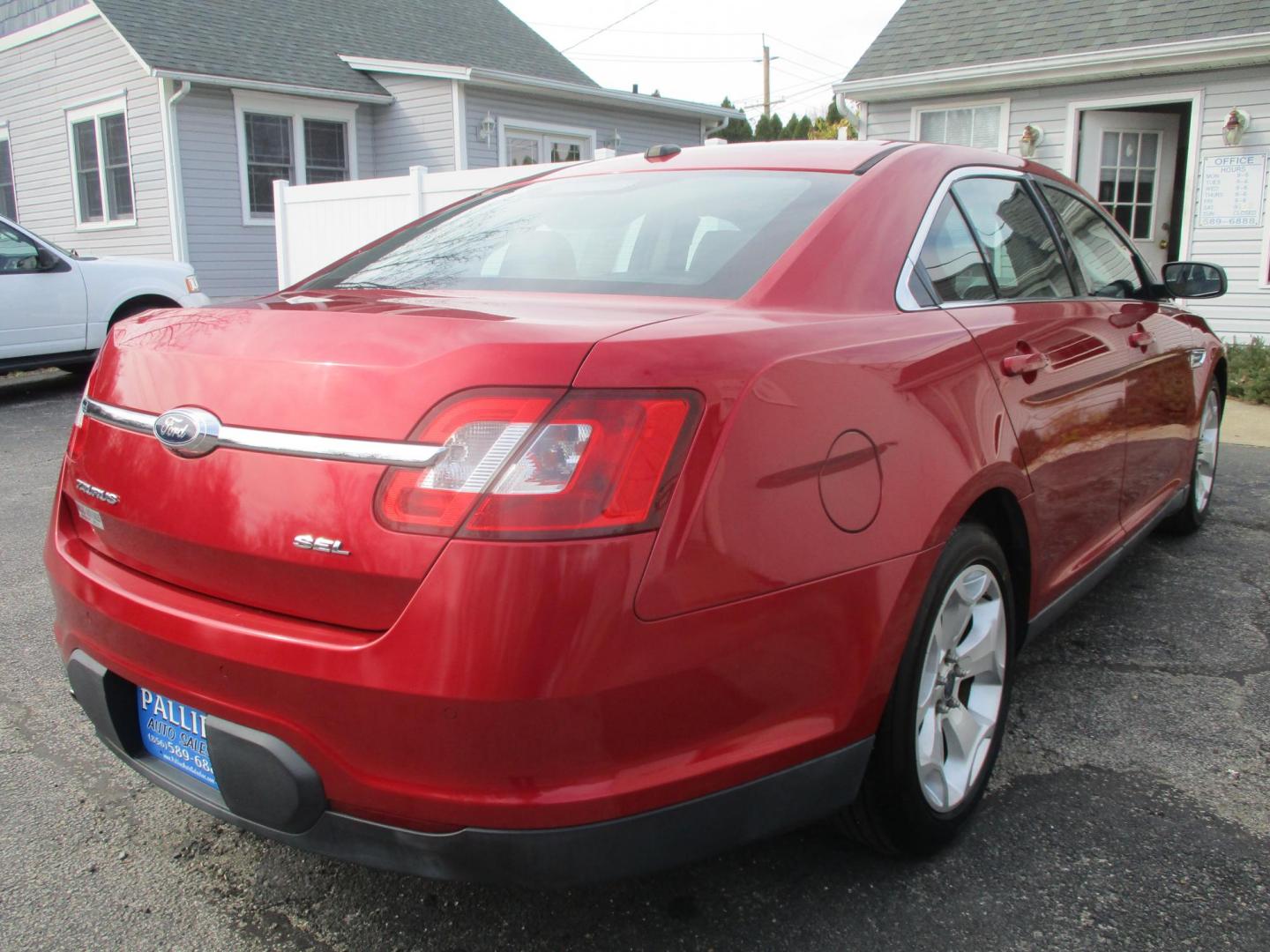 2011 RED Ford Taurus SEL FWD (1FAHP2EW4BG) with an 3.5L V6 DOHC 24V engine, 6-Speed Automatic transmission, located at 540a Delsea Drive, Sewell, NJ, 08080, (987) 867-5309, 39.752560, -75.111206 - Photo#6