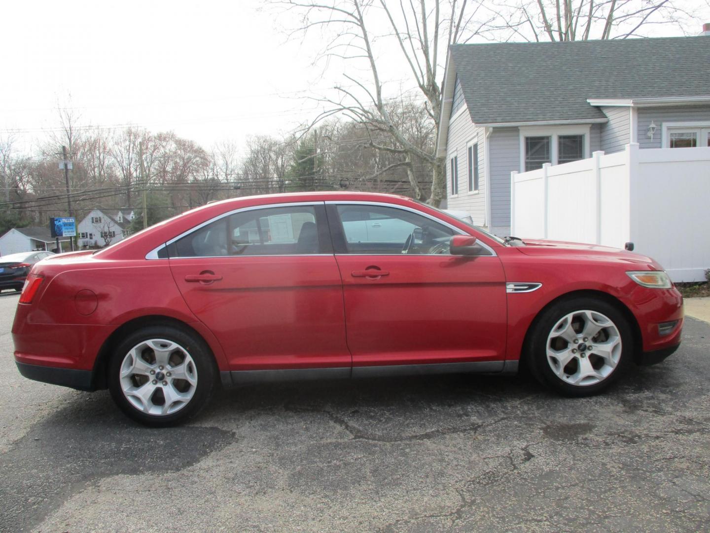 2011 RED Ford Taurus SEL FWD (1FAHP2EW4BG) with an 3.5L V6 DOHC 24V engine, 6-Speed Automatic transmission, located at 540a Delsea Drive, Sewell, NJ, 08080, (987) 867-5309, 39.752560, -75.111206 - Photo#7