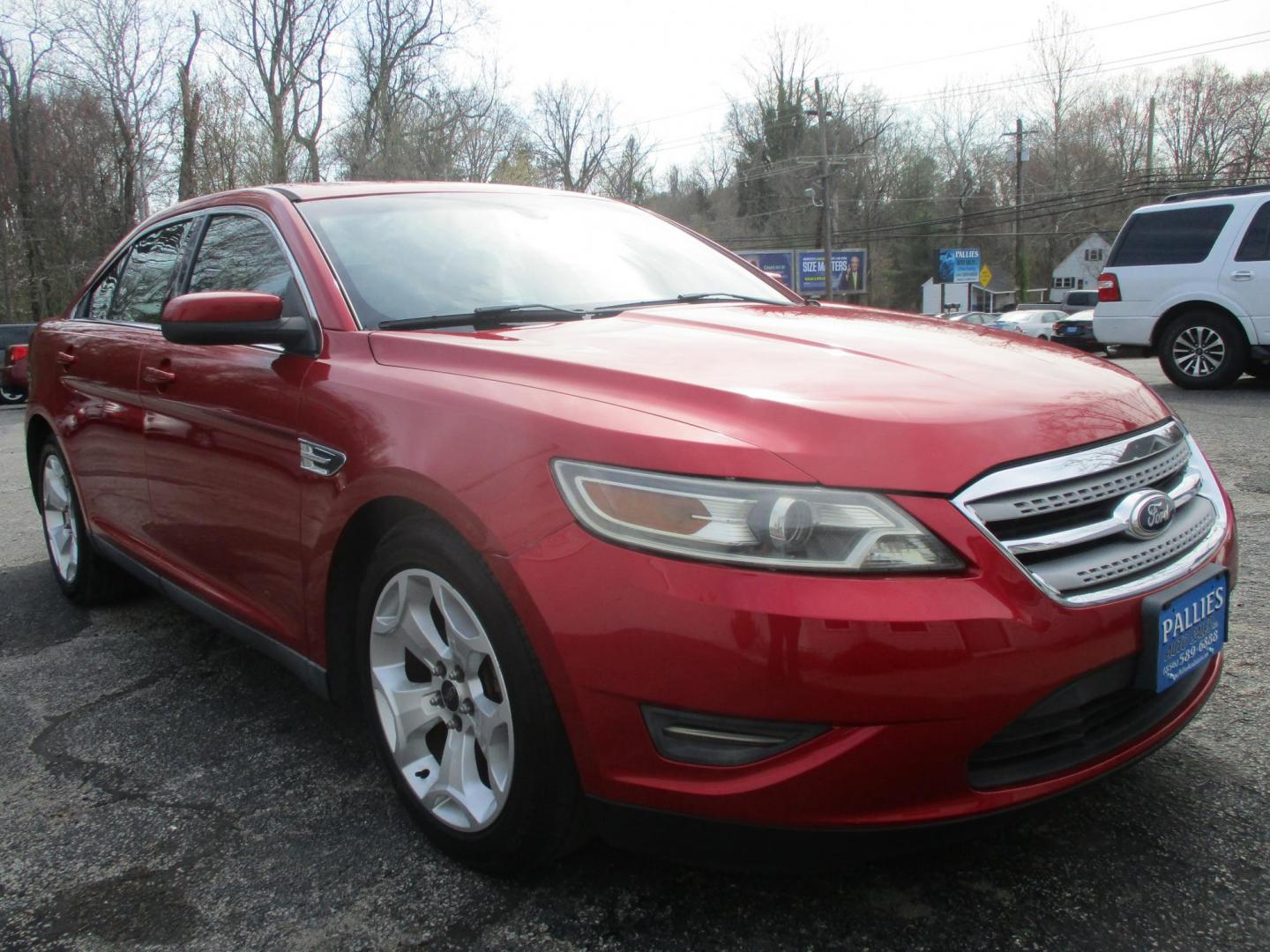 2011 RED Ford Taurus SEL FWD (1FAHP2EW4BG) with an 3.5L V6 DOHC 24V engine, 6-Speed Automatic transmission, located at 540a Delsea Drive, Sewell, NJ, 08080, (987) 867-5309, 39.752560, -75.111206 - Photo#8