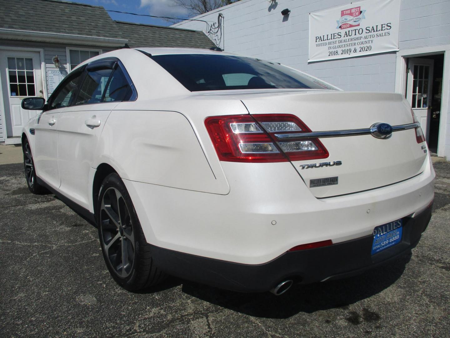 2015 WHITE Ford Taurus SEL AWD (1FAHP2H86FG) with an 3.5L V6 DOHC 24V engine, 6-Speed Automatic transmission, located at 540a Delsea Drive, Sewell, NJ, 08080, (987) 867-5309, 39.752560, -75.111206 - Photo#2