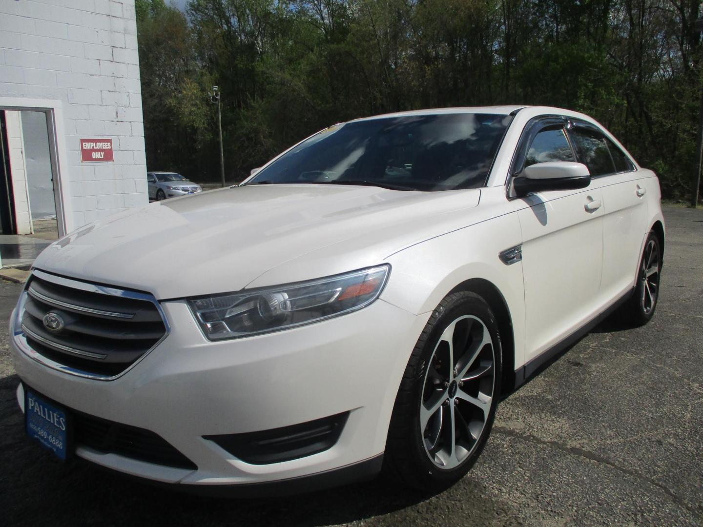 2015 WHITE Ford Taurus SEL AWD (1FAHP2H86FG) with an 3.5L V6 DOHC 24V engine, 6-Speed Automatic transmission, located at 540a Delsea Drive, Sewell, NJ, 08080, (987) 867-5309, 39.752560, -75.111206 - Photo#0