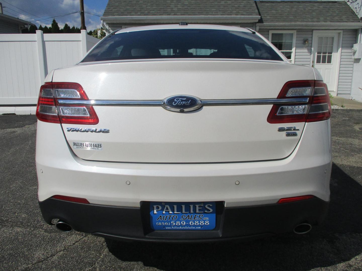 2015 WHITE Ford Taurus SEL AWD (1FAHP2H86FG) with an 3.5L V6 DOHC 24V engine, 6-Speed Automatic transmission, located at 540a Delsea Drive, Sewell, NJ, 08080, (987) 867-5309, 39.752560, -75.111206 - Photo#3