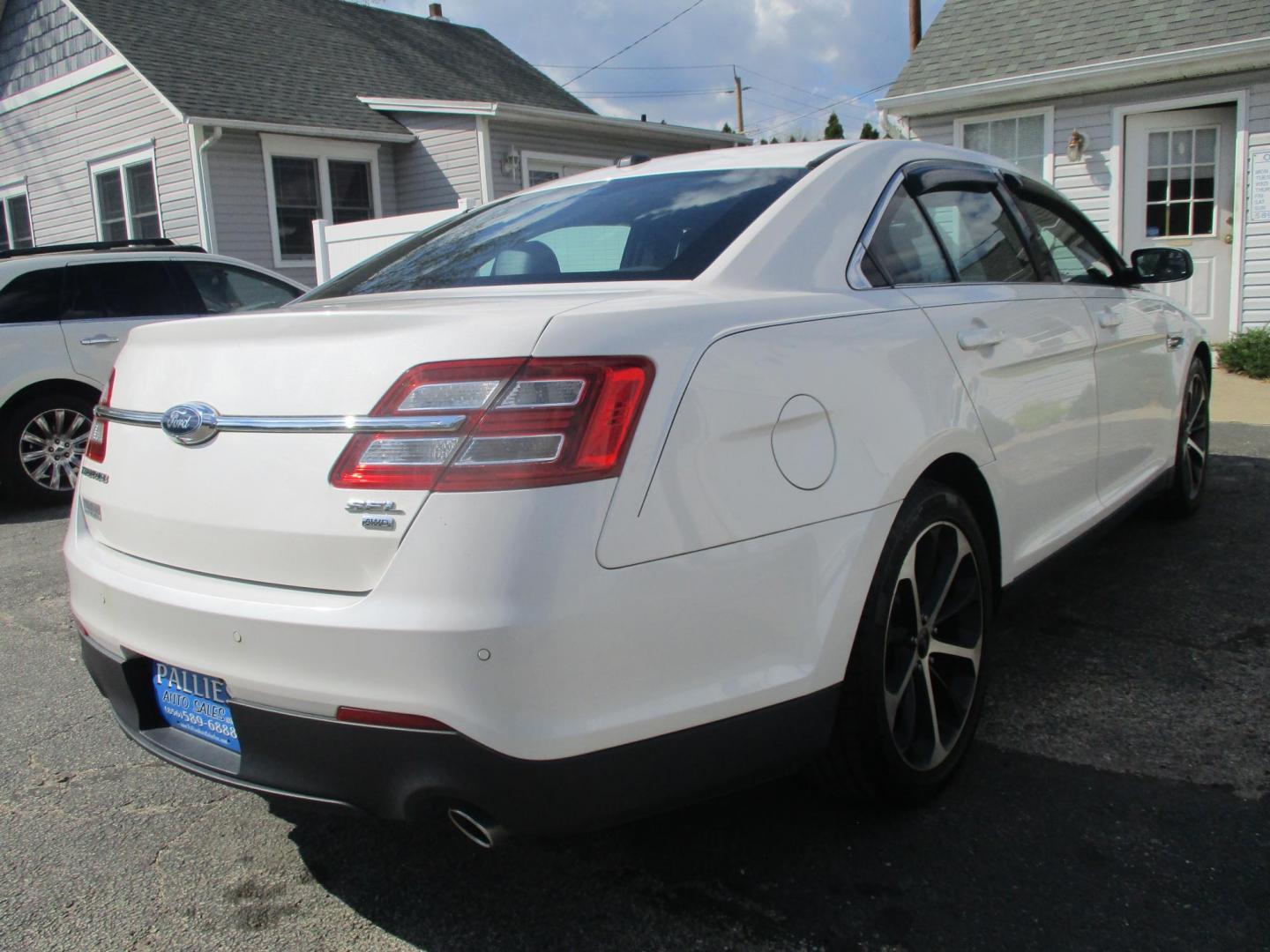 2015 WHITE Ford Taurus SEL AWD (1FAHP2H86FG) with an 3.5L V6 DOHC 24V engine, 6-Speed Automatic transmission, located at 540a Delsea Drive, Sewell, NJ, 08080, (987) 867-5309, 39.752560, -75.111206 - Photo#6