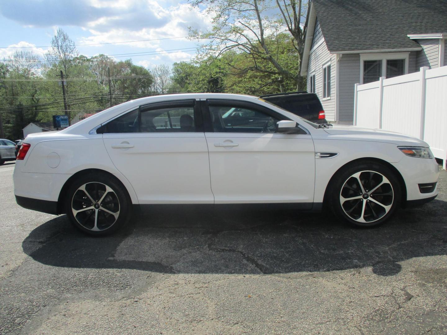 2015 WHITE Ford Taurus SEL AWD (1FAHP2H86FG) with an 3.5L V6 DOHC 24V engine, 6-Speed Automatic transmission, located at 540a Delsea Drive, Sewell, NJ, 08080, (987) 867-5309, 39.752560, -75.111206 - Photo#7
