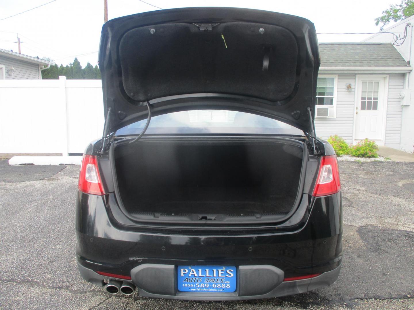 2012 BLACK Ford Taurus SEL FWD (1FAHP2EW5CG) with an 3.5L V6 DOHC 24V engine, 6-Speed Automatic transmission, located at 540a Delsea Drive, Sewell, NJ, 08080, (987) 867-5309, 39.752560, -75.111206- Photo#25
