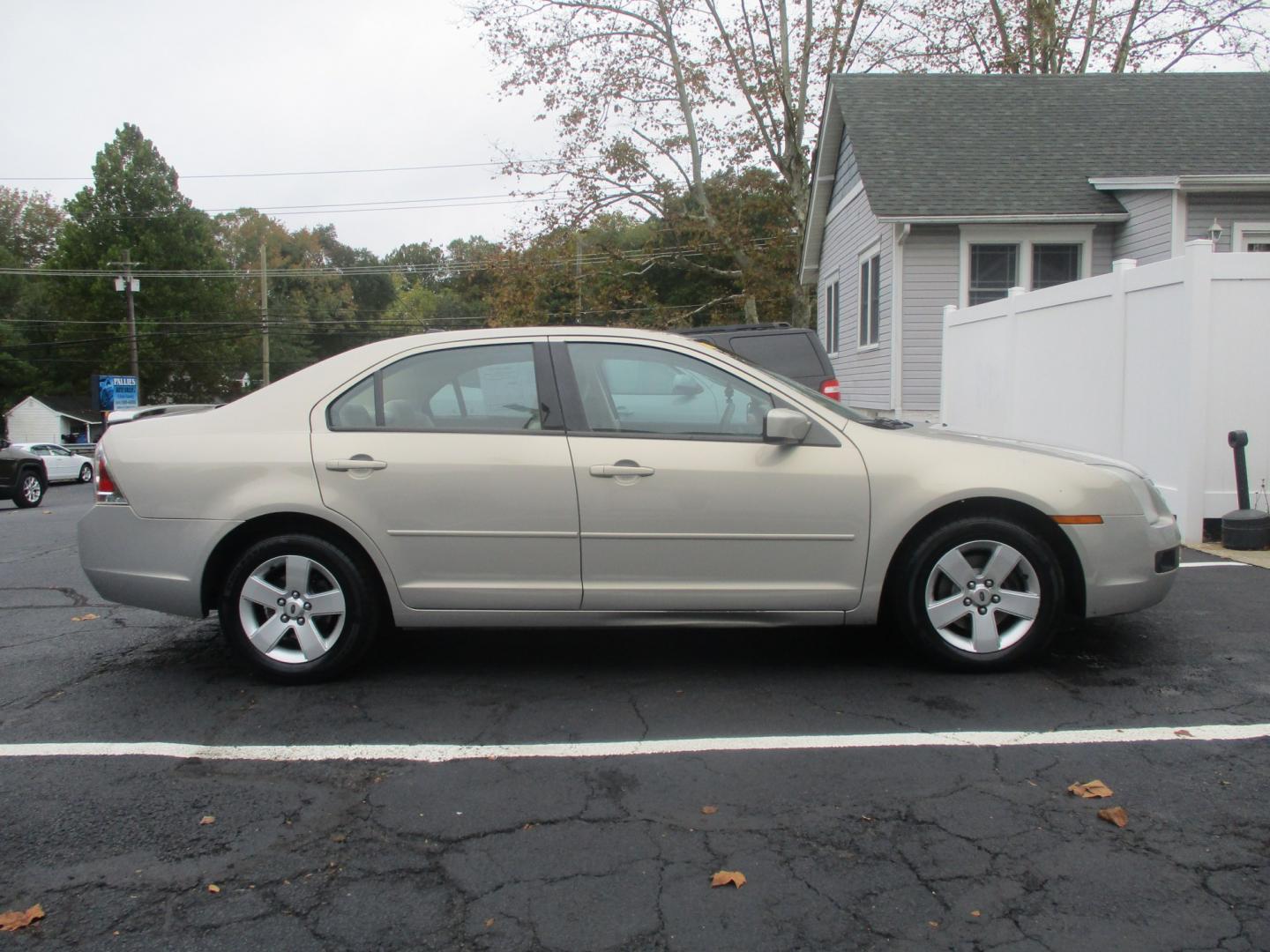 2009 GOLD Ford Fusion V6 SE (3FAHP07189R) with an 3.0L V6 DOHC 24V engine, located at 540a Delsea Drive, Sewell, NJ, 08080, (987) 867-5309, 39.752560, -75.111206- Photo#1